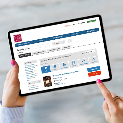 Schlow's Catalog displaying on an ipad held in a person's hand