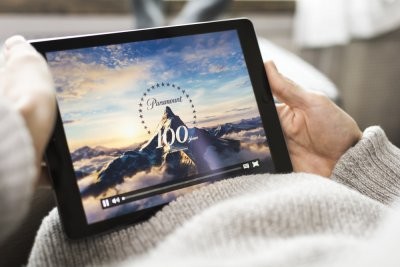 An up-close picture of someone watching a movie on their tablet