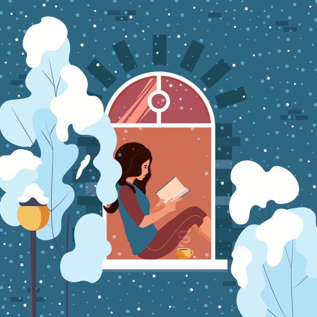 Woman reading in a window