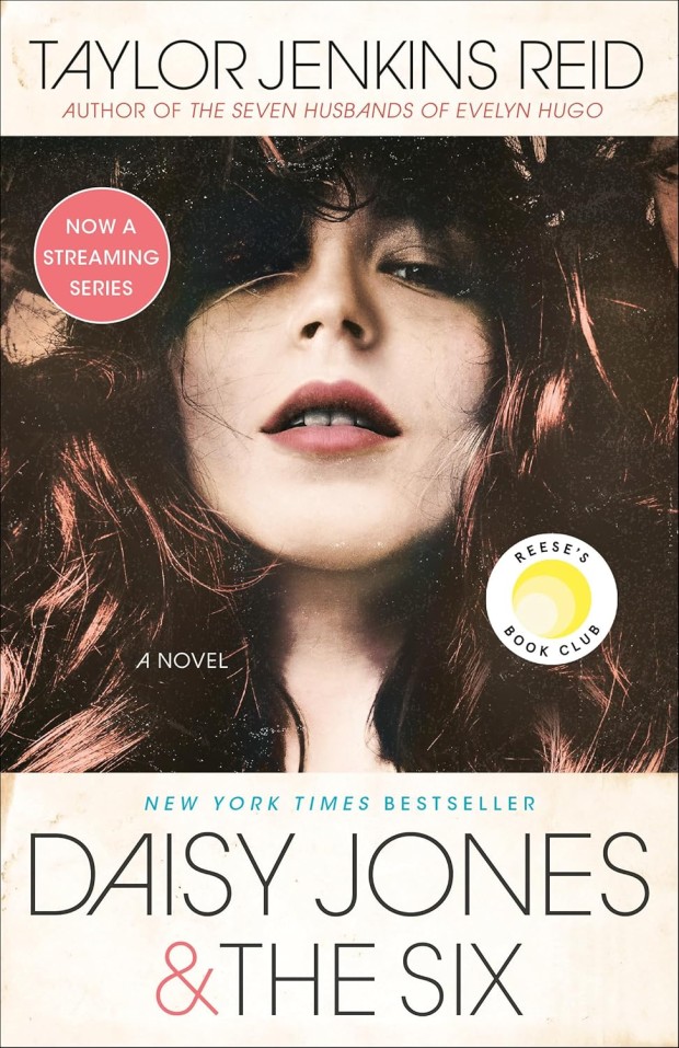 Image of Daisy Jones and the Six book clover, includes woman with 70's syle brown hair