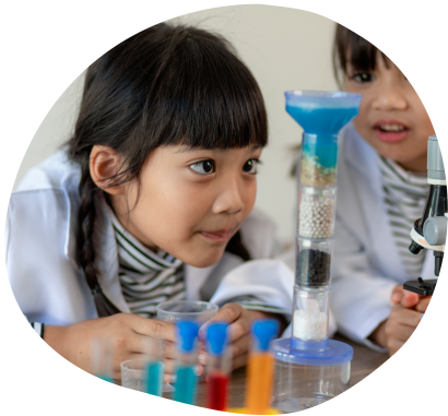 Child observing a STEM experiment