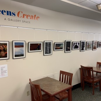 Image of Teen gallery wall with photographs hanging in a row